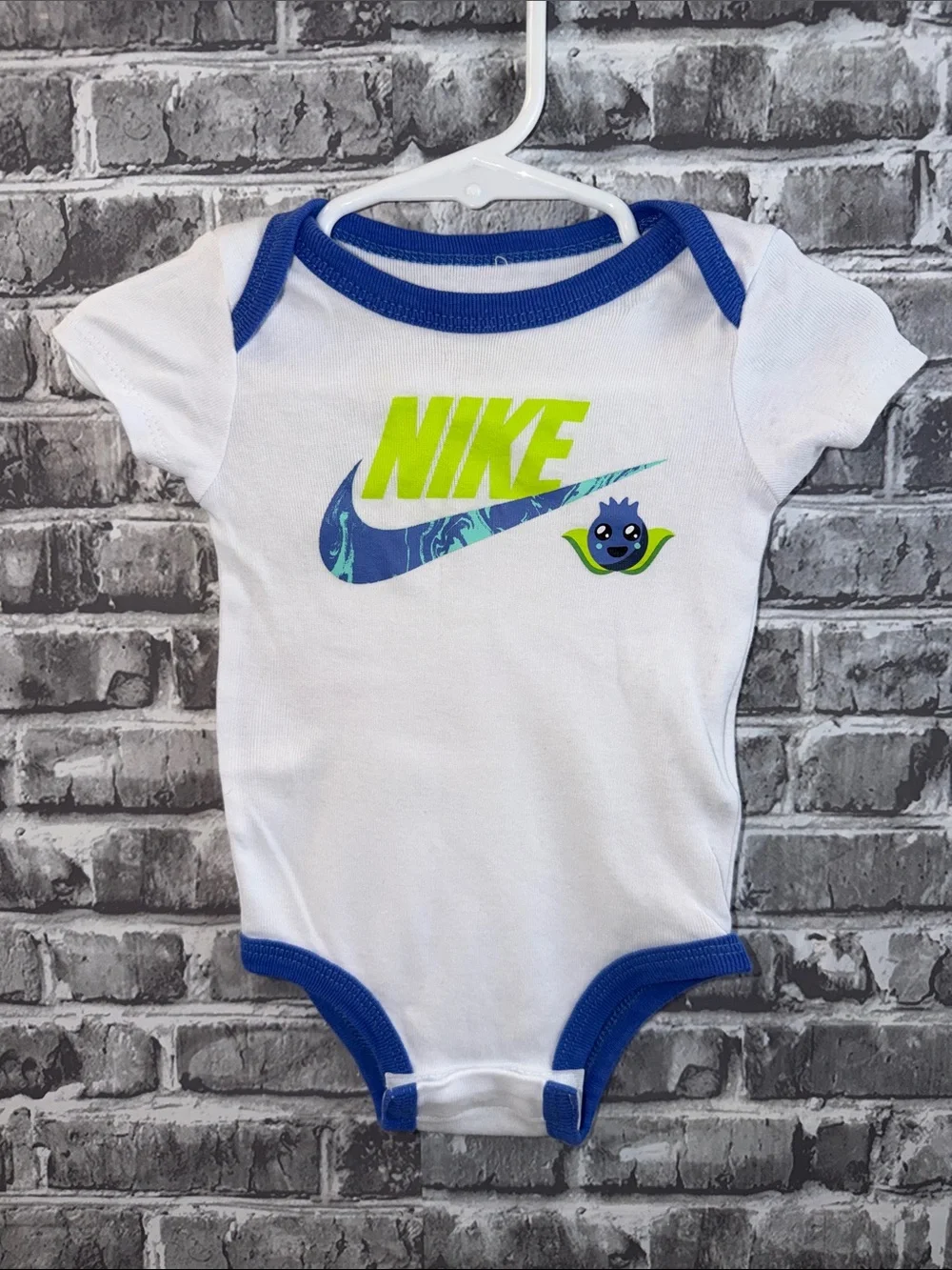 Baby Nike White One-Piece Bodysuit with Blue Trim & Neon Green Logo‎